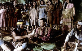Der gebrochene Pfeil, Szenenbild: Ein &quot;weißer&quot; Mann im Kreis von Native Americans.(© picture alliance / United Archives)